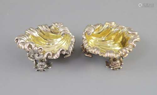 A pair of George IV silver shell shaped salts, by Paul Storr...