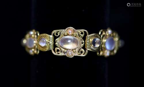 An early 20th century Arts & Crafts gold, cabochon moonstone...