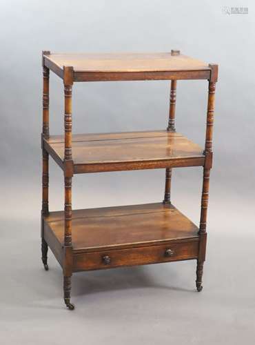 An early Victorian rosewood whatnot,with three stages and ba...