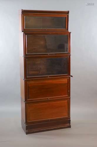 A Globe Wernicke mahogany sectional bookcase,with inset glaz...