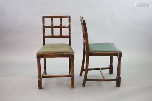 A set of eight early 20th century oak and beech dining chair...