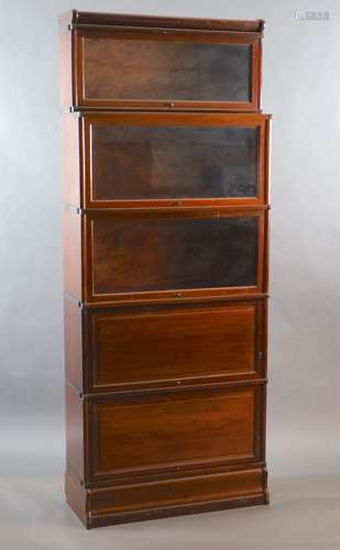 A Globe Wernicke mahogany sectional bookcase,with recessed g...