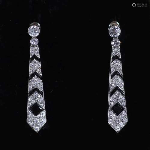 A pair of Cartier Art Deco French platinum, black onyx and d...