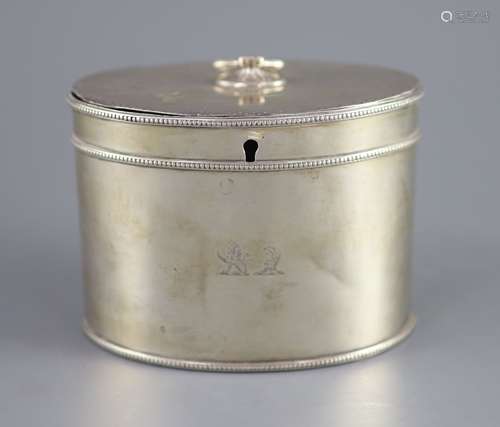 A George III silver oval tea caddy by John Younge & Co,with ...