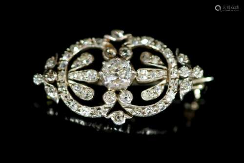 An Edwardian gold, silver and diamond set openwork oval broo...