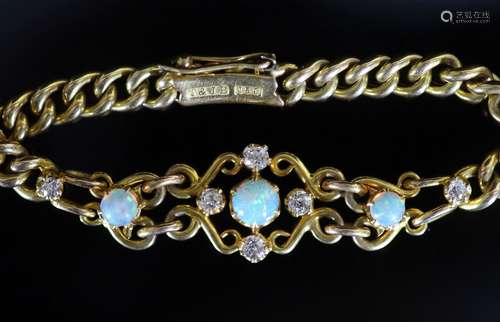 An early 20th century 15ct gold white opal and diamond set c...