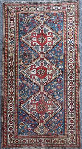 An antique Qashqai blue ground rug184 x 95cm