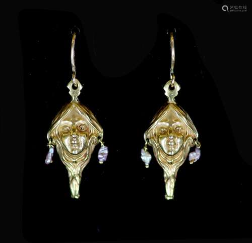 A pair of Art Nouveau gold and baroque pearl set drop earrin...