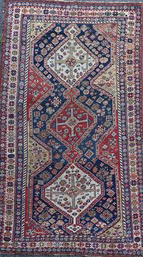 An antique Qashqai blue ground rug220 x 127cm