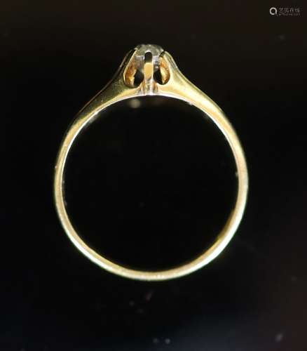 A mid 20th century 18ct gold and claw set oval cut solitaire...