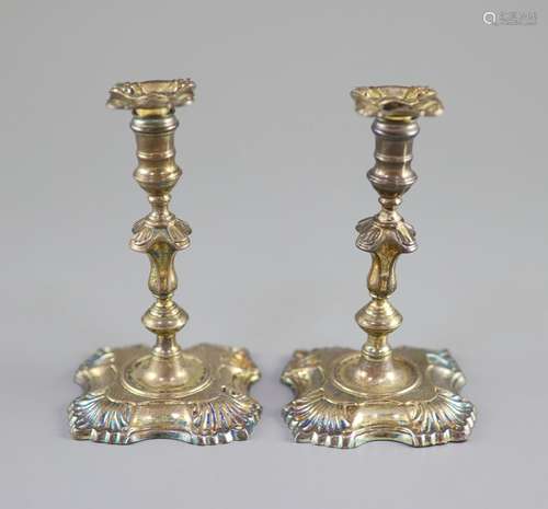 A pair of George II cast silver tapersticks, by Richard Gurn...