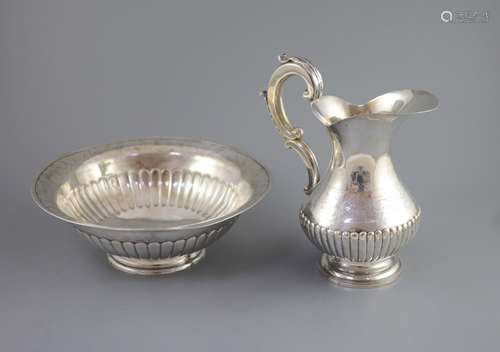 A mid 19th century Portuguese silver jug and bowl set,with e...