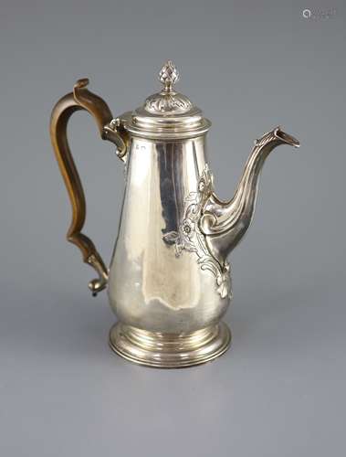 A George II silver coffee pot by Alexander Johnston,of taper...