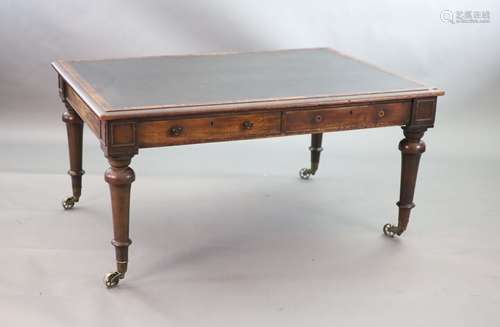 A Victorian mahogany library table,the rectangular top inset...