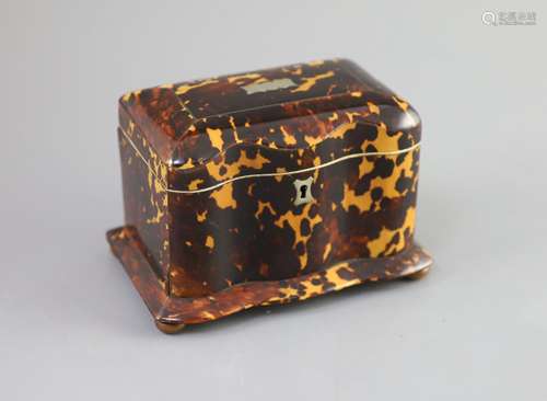 A 19th century tortoiseshell tea caddy,of serpentine form, w...