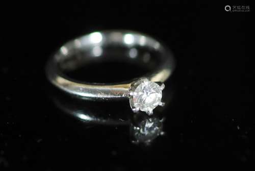 A modern Tiffany & Co platinum and round brilliant cut solit...