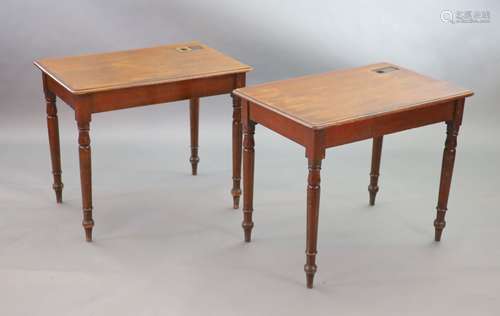 A pair of Victorian mahogany writing tables,with rounded rec...