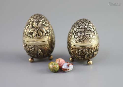 A graduated pair of Edwardian novelty silver gilt condiments...