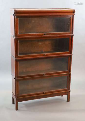 A Globe Wernicke mahogany four section bookcase,with sliding...