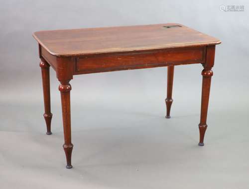 A Victorian mahogany writing table,with rounded rectangular ...