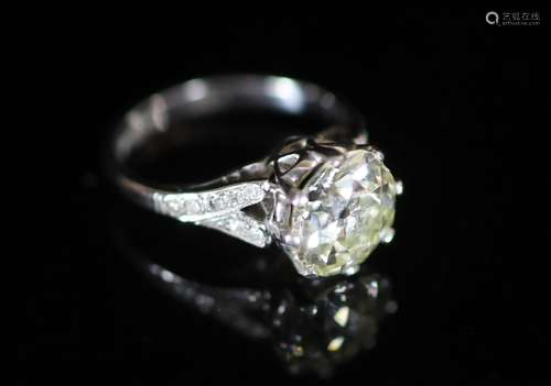 A 20th century 18ct white gold and platinum set single stone...