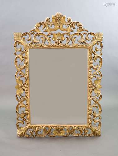 A late 19th century Florentine giltwood wall mirror,with fol...