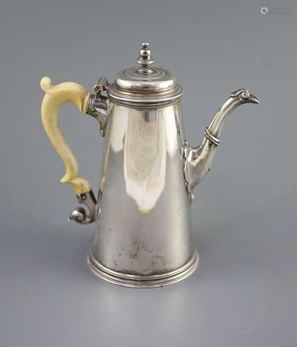 A George II silver coffee pot, by Robert Lucas,of tapering c...