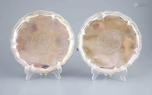 A pair of early George III silver salvers by Richard Rugg,of...