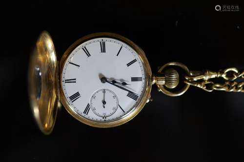 A late 19th/early 20th century 18K gold half hunter keyless ...