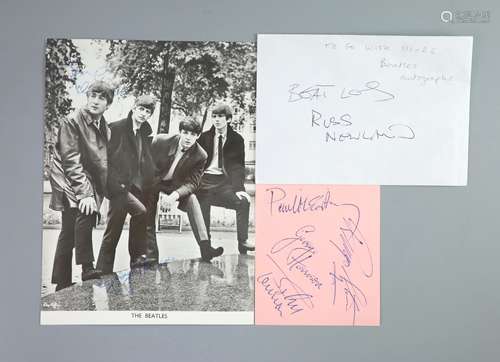 The Beatles, a set of four autographs on pink paper and a co...