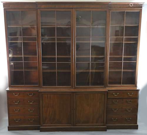 A George III mahogany breakfront library bookcase,with mould...