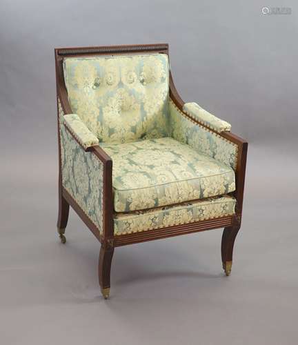 A Regency mahogany library armchair,with reeded frame, uphol...