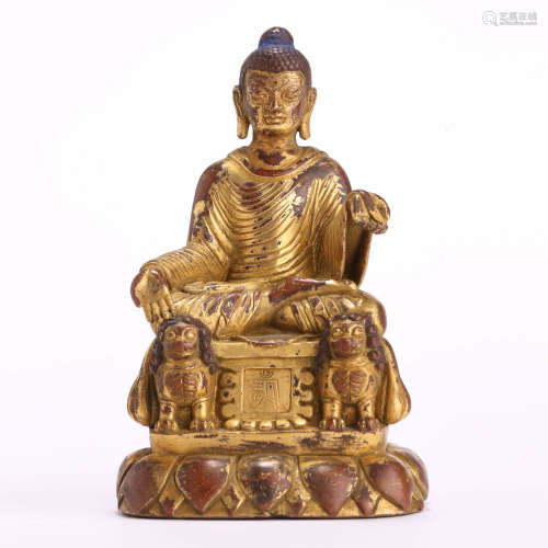A Gilt Bronze Statue Of Shakyamuni