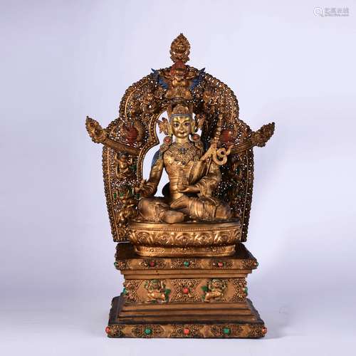 A Gilt Bronze Statue Of Padmasambhava