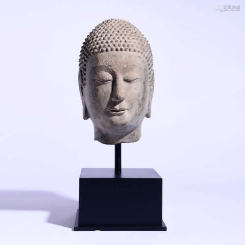 A Carved Stone Buddha Head