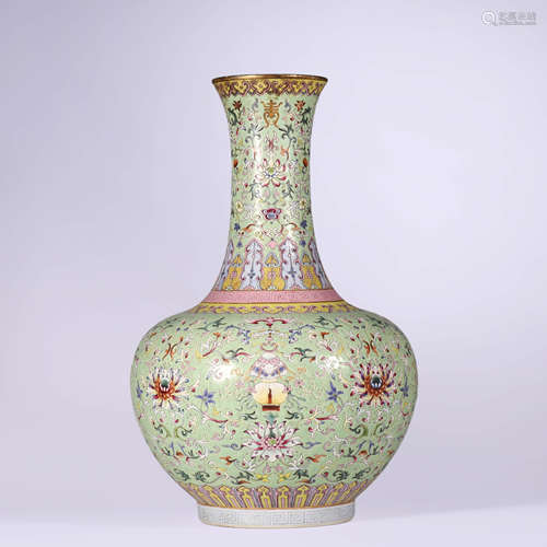 A Green-Ground Famille Rose Interlocking Lotus Bottle Vase