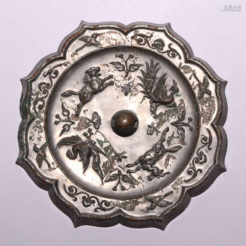 A Bronze Twin Beast Foliate-Edge Mirror