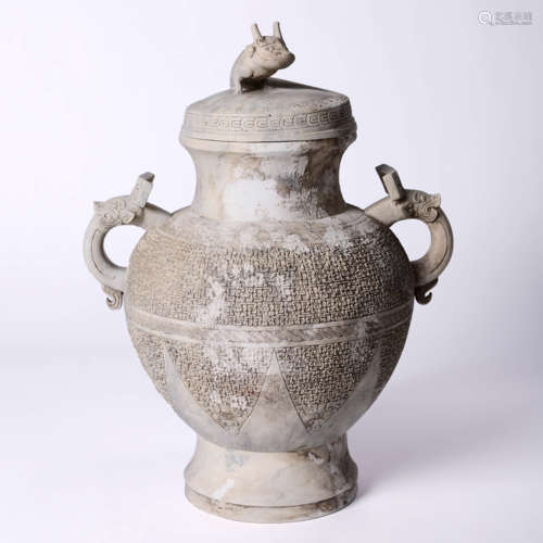 A Chicken-Bone Jade Double-Eared Pot And Cover