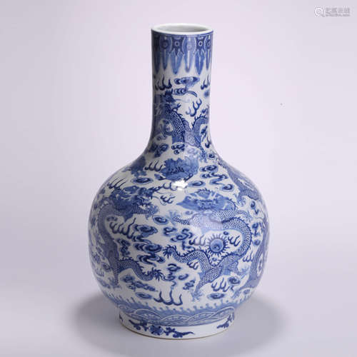 A Blue And White Dragon Bottle Vase