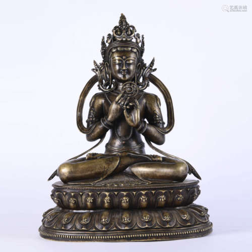 A Silver Seated Maitreya Statue