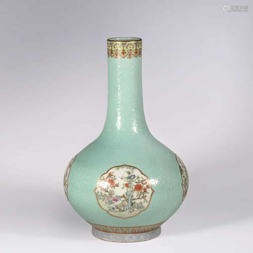 A Turquoise-Ground Famille Rose Flowers Bottle Vase