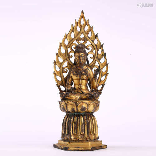 A Gilt Bronze Statue Of Seated Shakyamuni