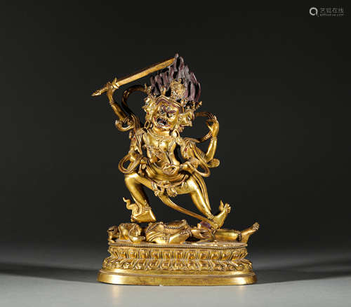 A GILT BRONZE STATUE OF MAHAKALA