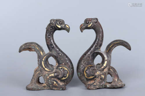 A PAIR OF PARCEL GILT BRONZE MYTHICAL BIRD ORNAMENTS