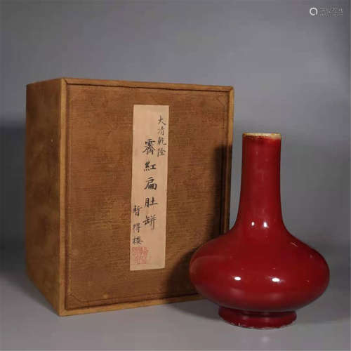 AN ALTAR RED GLAZE BOTTLE VASE