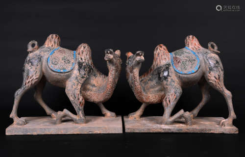 A PAIR OF PAINTED QING STONE BACTRIAN CAMEL ORNAMENTS