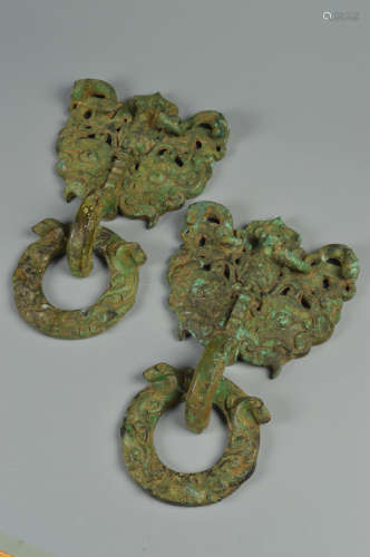 A PAIR OF ARCHAIC BRONZE BEAST HOLDERS