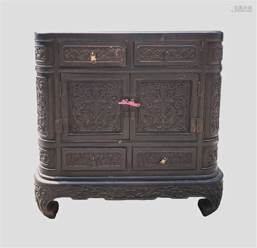 A CHINESE SANDALWOOD DRAGON AND GRASS ROUND-CORNER CABINET