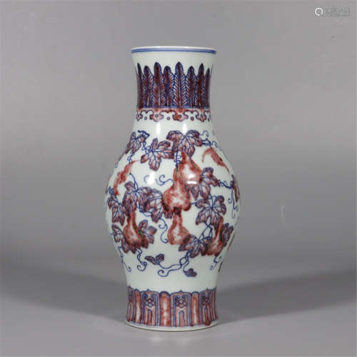 AN UNDERGLAZE-BLUE AND COPPER-RED DOUBLE GOURD VASE