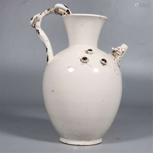 A DING WARE WHITE-GLAZED EWER